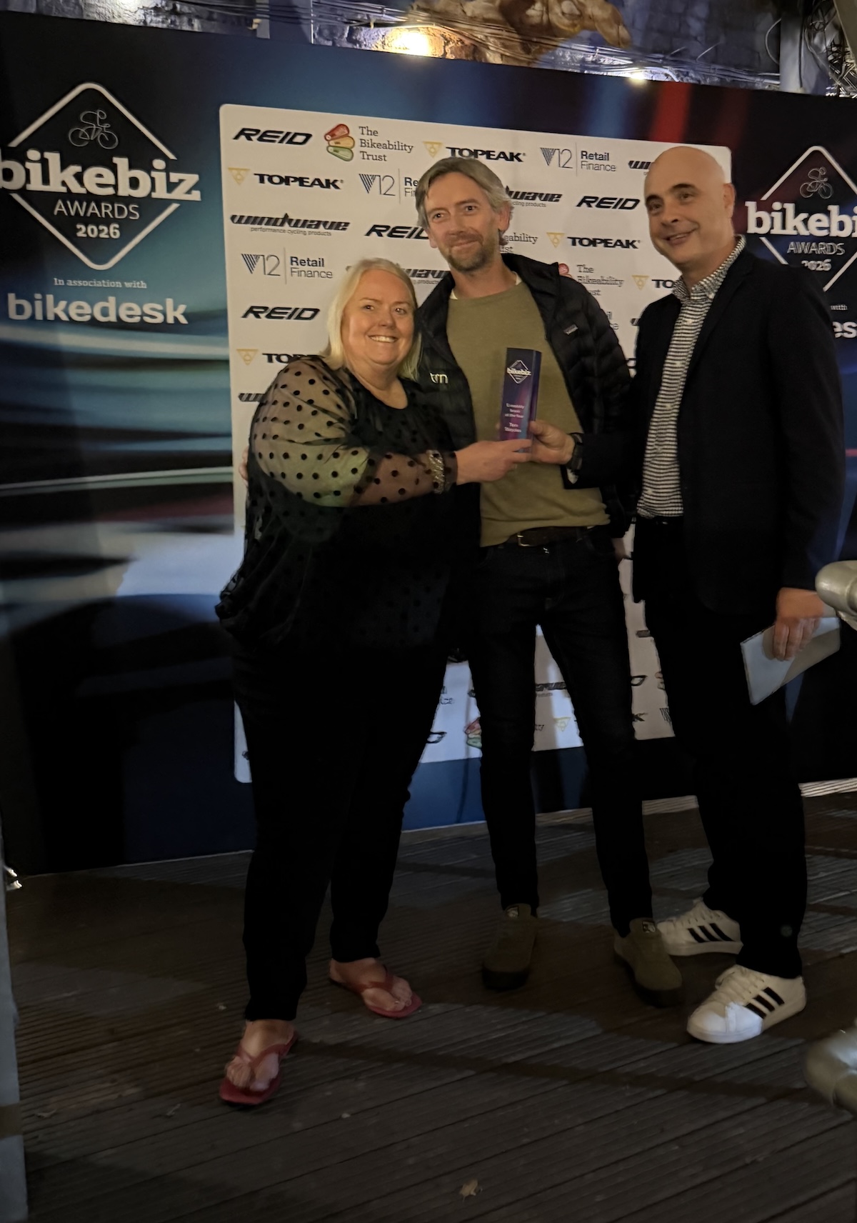 Marco Faimali, co-founder of Bikesy, presenting the E-Mobility Brand of the Year award to Tern at the BikeBiz Awards 2026 in Birmingham